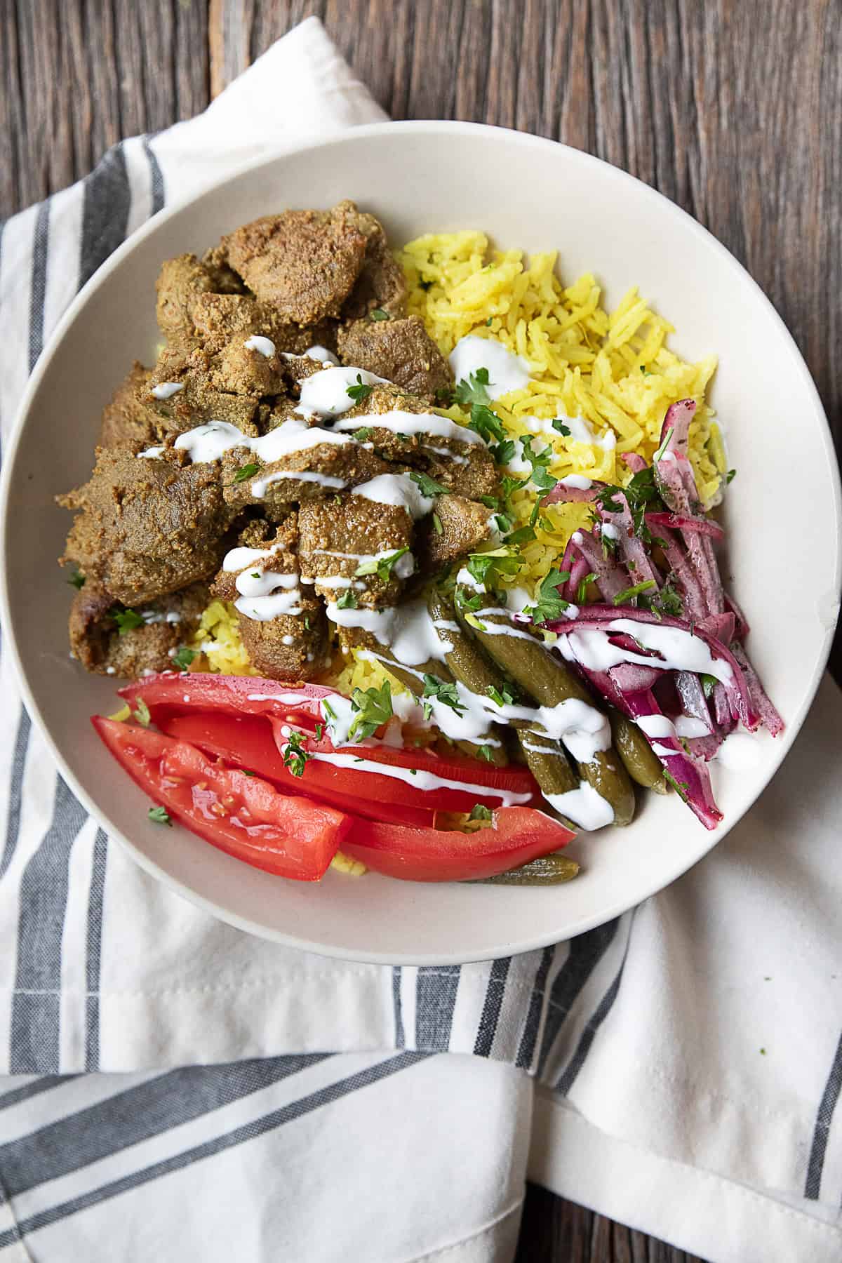 How to Make Lamb Shawarma Rice Bowl seared lamb shawarma bowl with rice and fixings