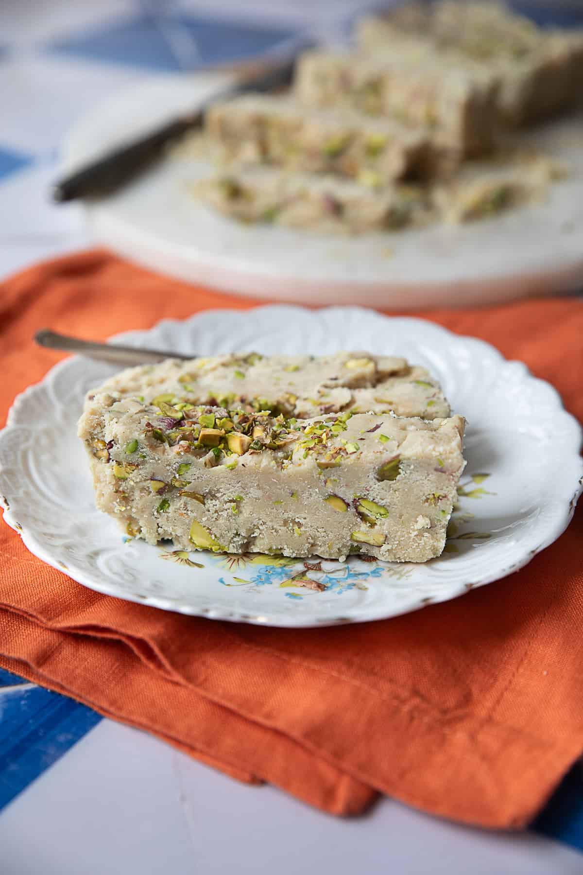 Easiest Tahini Halva Recipe tahini halva pieces served up in a white plate