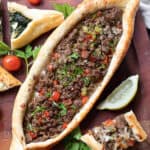 Turkish pide with different toppings.