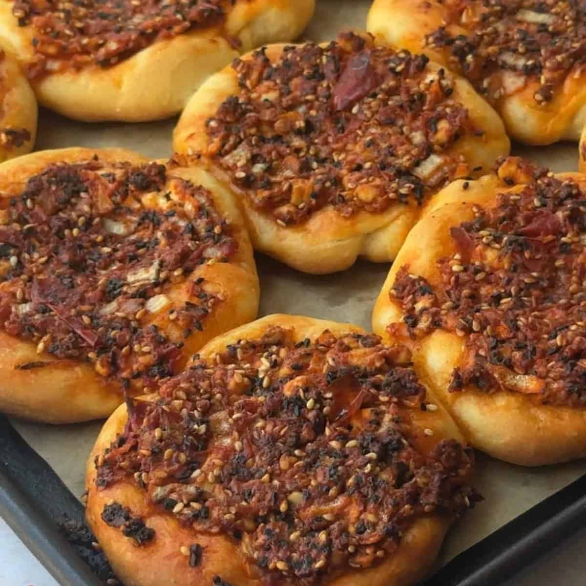 How to Make Biberli Ekmek top biberli ekmek dough with red pepper paste mixture