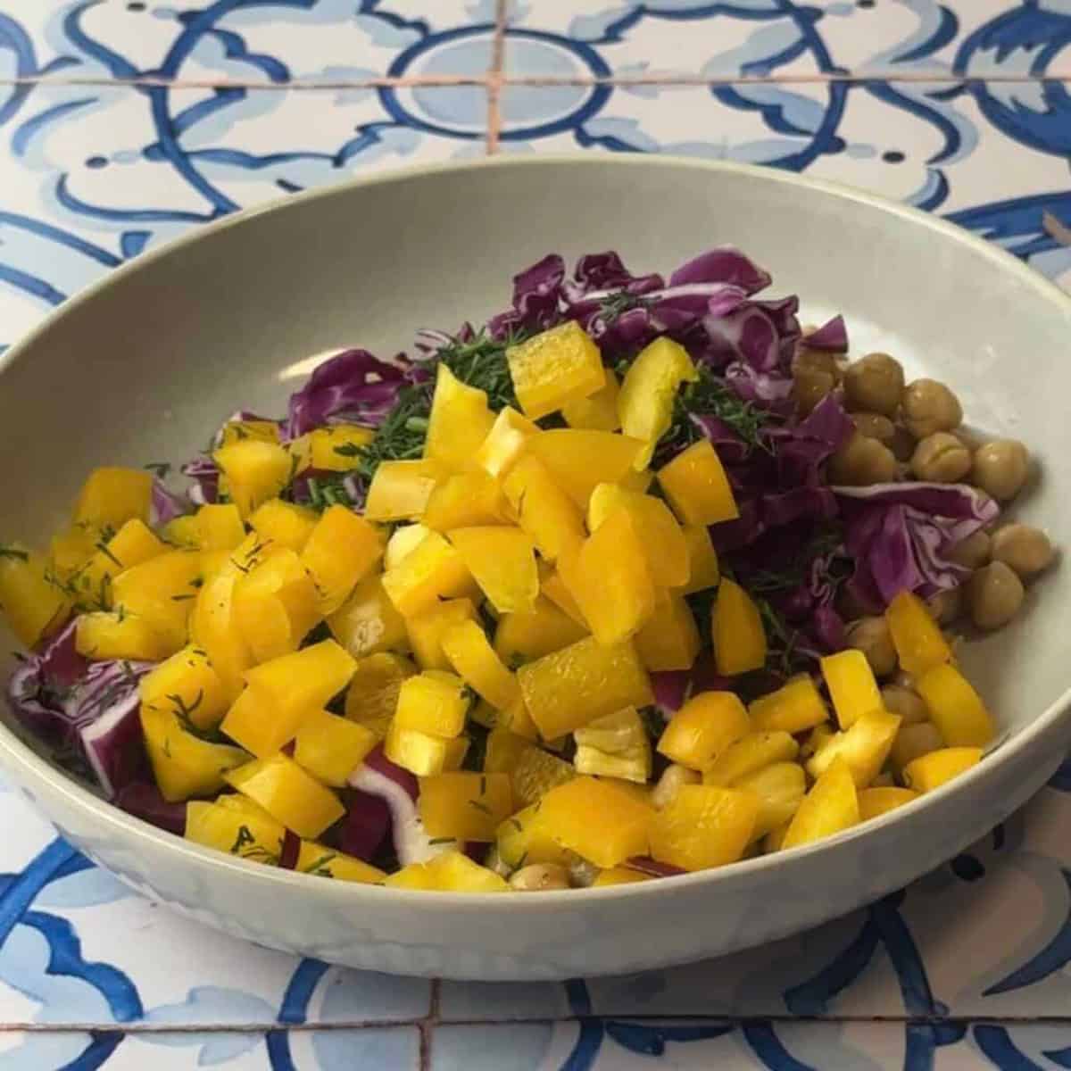 How to Make Mediterranean Chickpea Salad add peppers and olives