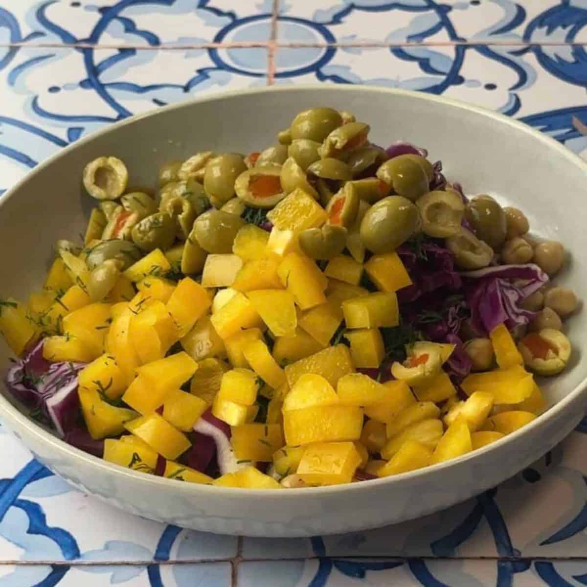 How to Make Mediterranean Chickpea Salad add peppers and olives