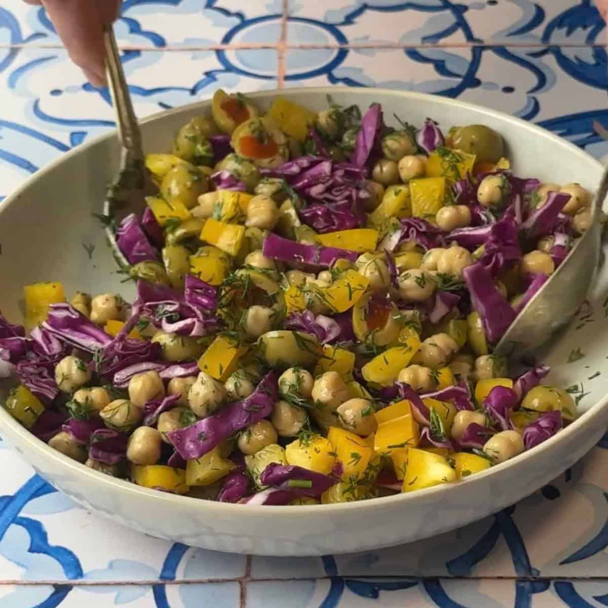 How to Make Mediterranean Chickpea Salad mix all the ingredients