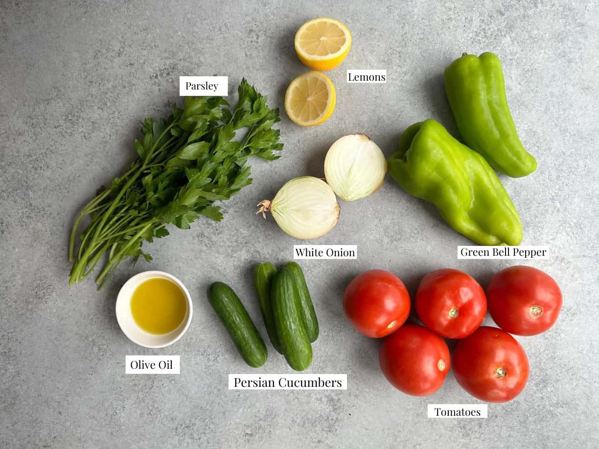 Coban Salatasi ingredients are tomatoes, cucumbers, parsley, onion, peppers and olive oil