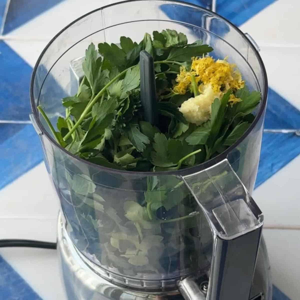 How to Make Gremolata pulsing parsley, lemon zest, and garlic in food processor