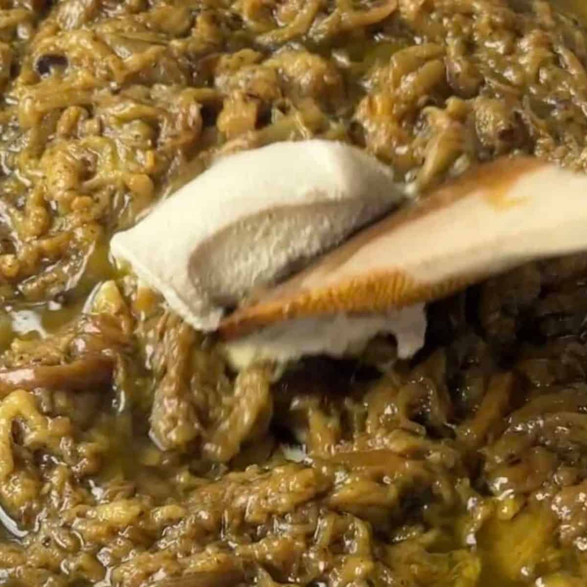 Add the kashk and mix.