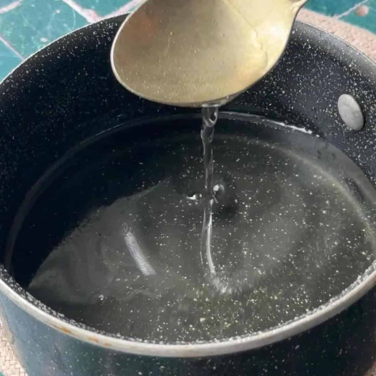 thick sugar syrup in a sauce pan
