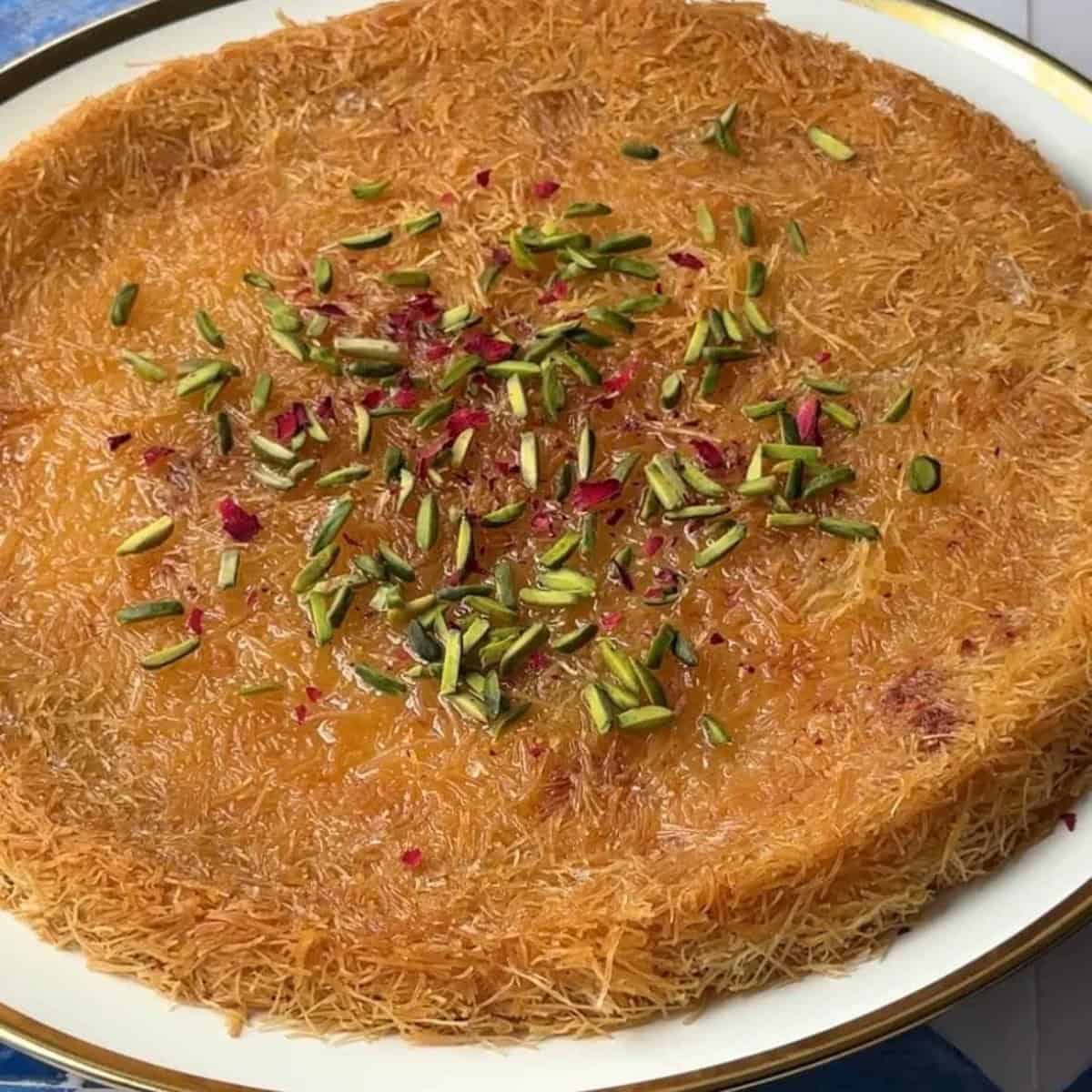 hot kunafa drizzled with sugar syrup
