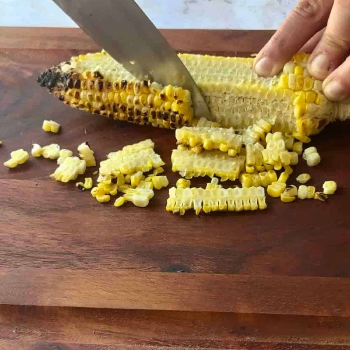 Grill the corn and cut the kernels off.