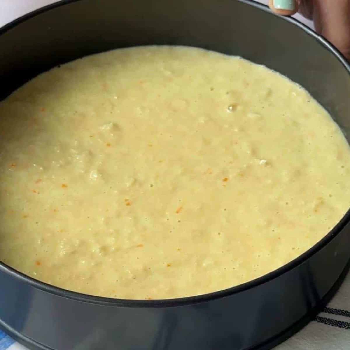 How To Make Greek Orange Cake pour the batter into the cake pan