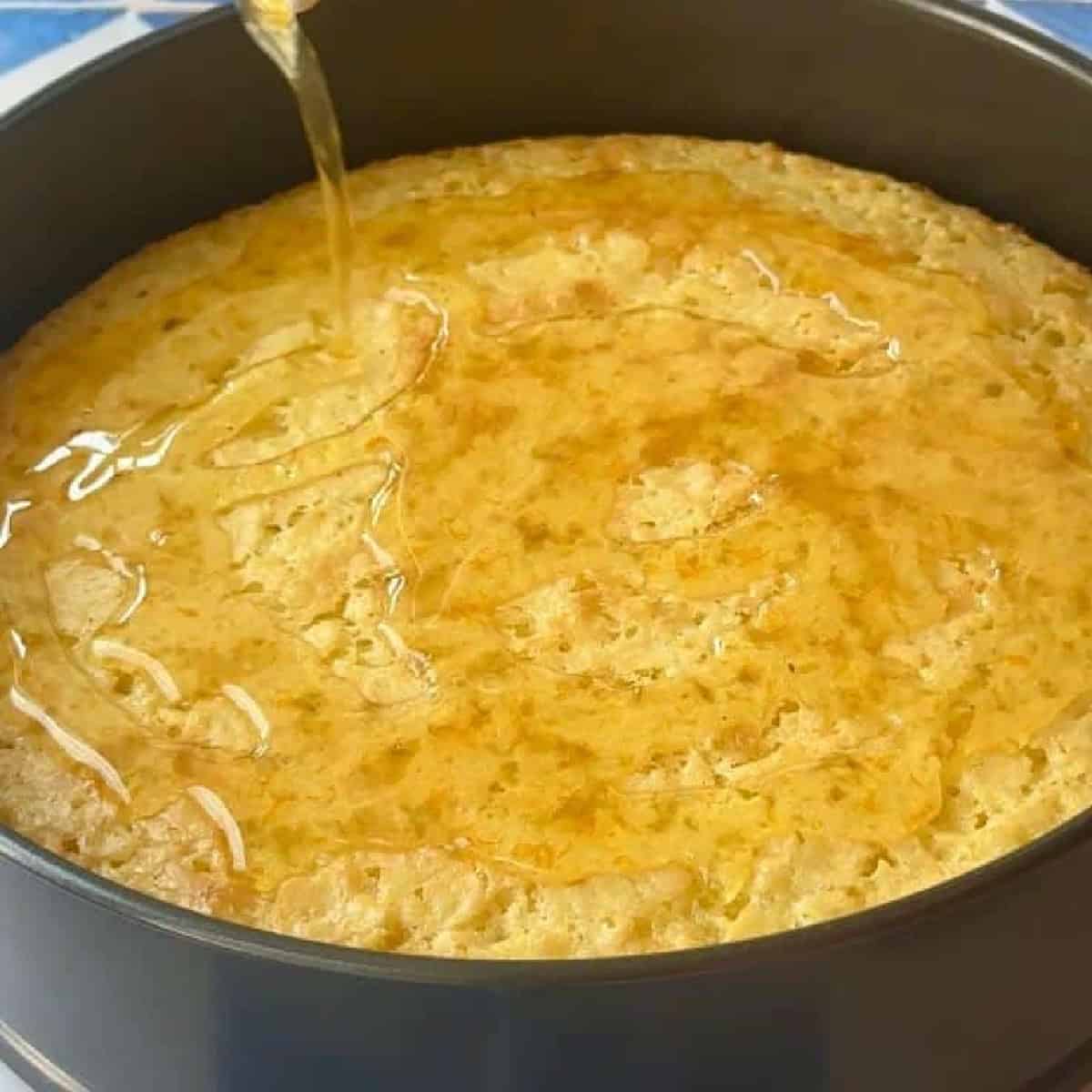 How To Make Greek Orange Cake pour the syrup on the cake