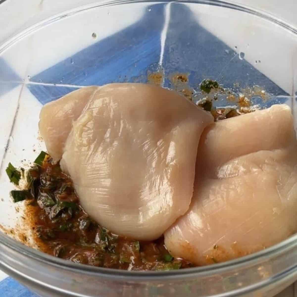 How to Make Middle Eastern Inspired Chicken Breast add chicken to marinade and mix well
