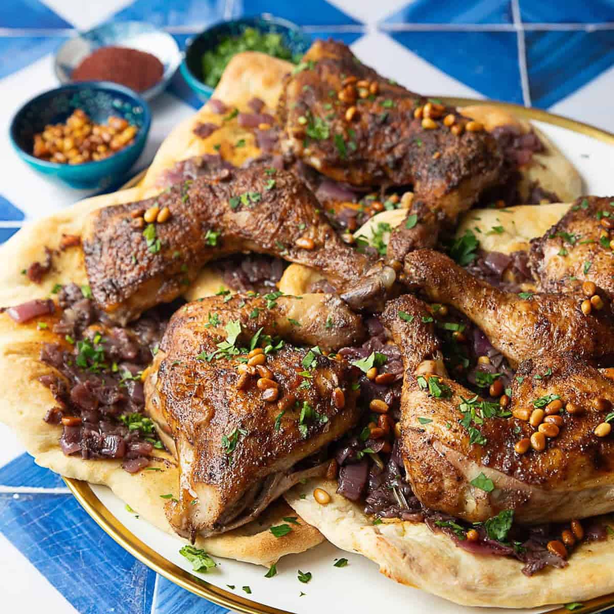 Traditional Palestinian Msakhan musakhan or Palestinian sumac and onion chicken served on taboon flatbread