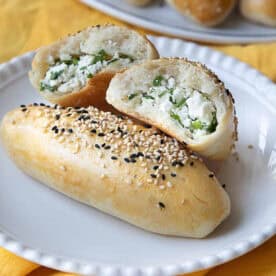 A plate of golden-brown, freshly baked Pogaca.