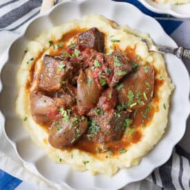 Stifado Greek beef stew with onions and red wine.