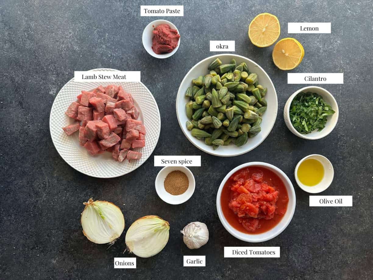 Bamya Ingredients bamya ingredients: frozen okra, olive oil, lamb cubes, tomato paste, diced tomato, onion, garlic, spices, parsley, and lemon