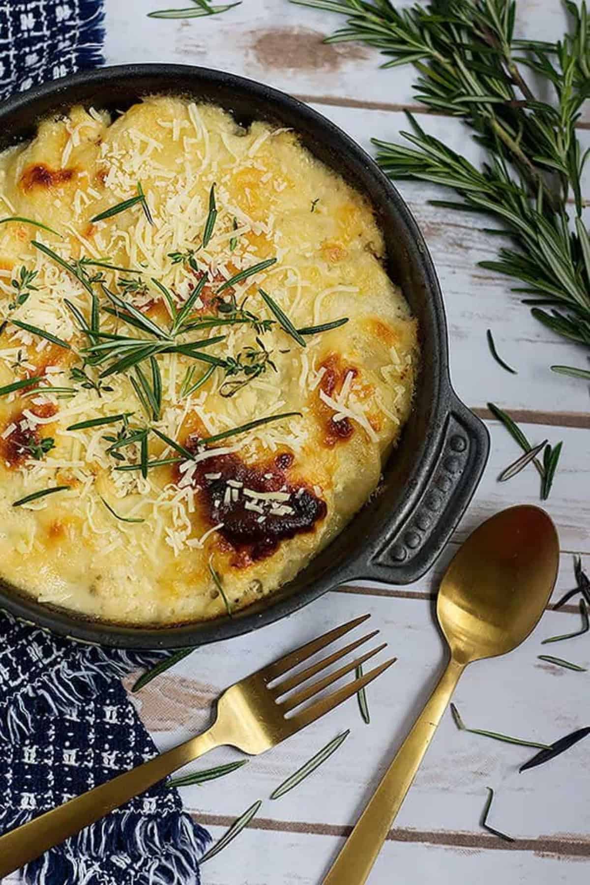 This cheesy scalloped potatoes recipe is a keeper. It's rich and creamy, with so much flavor and makes any meal so much better!
