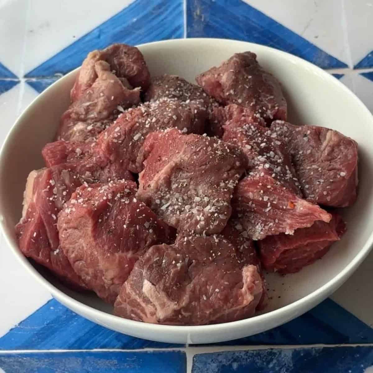 season the beef with slat and pepper.