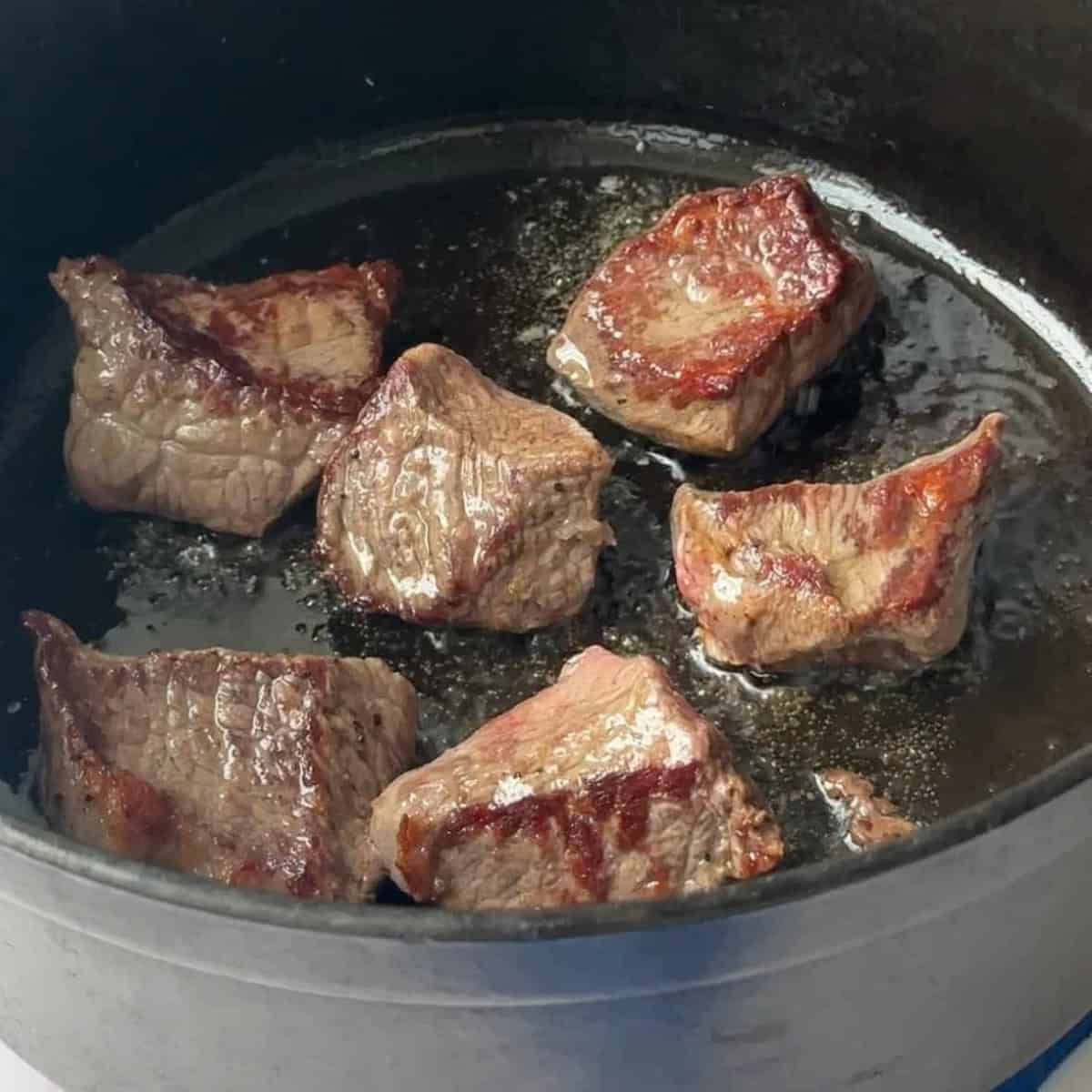 sear the beef in batches