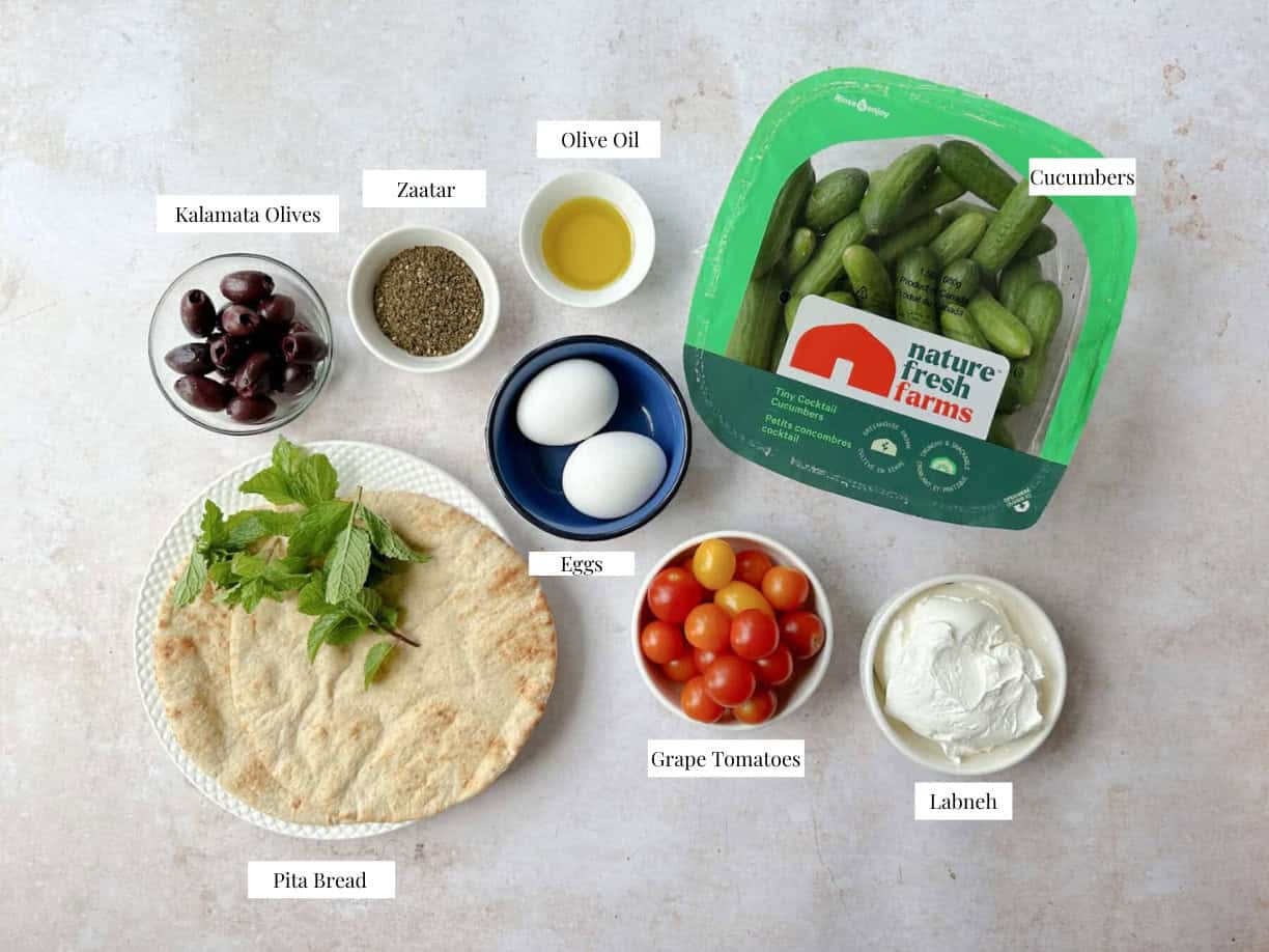To make this recipe you need labneh, eggs, cucumbers, olive oil, zaatar, tomatoes and olives.