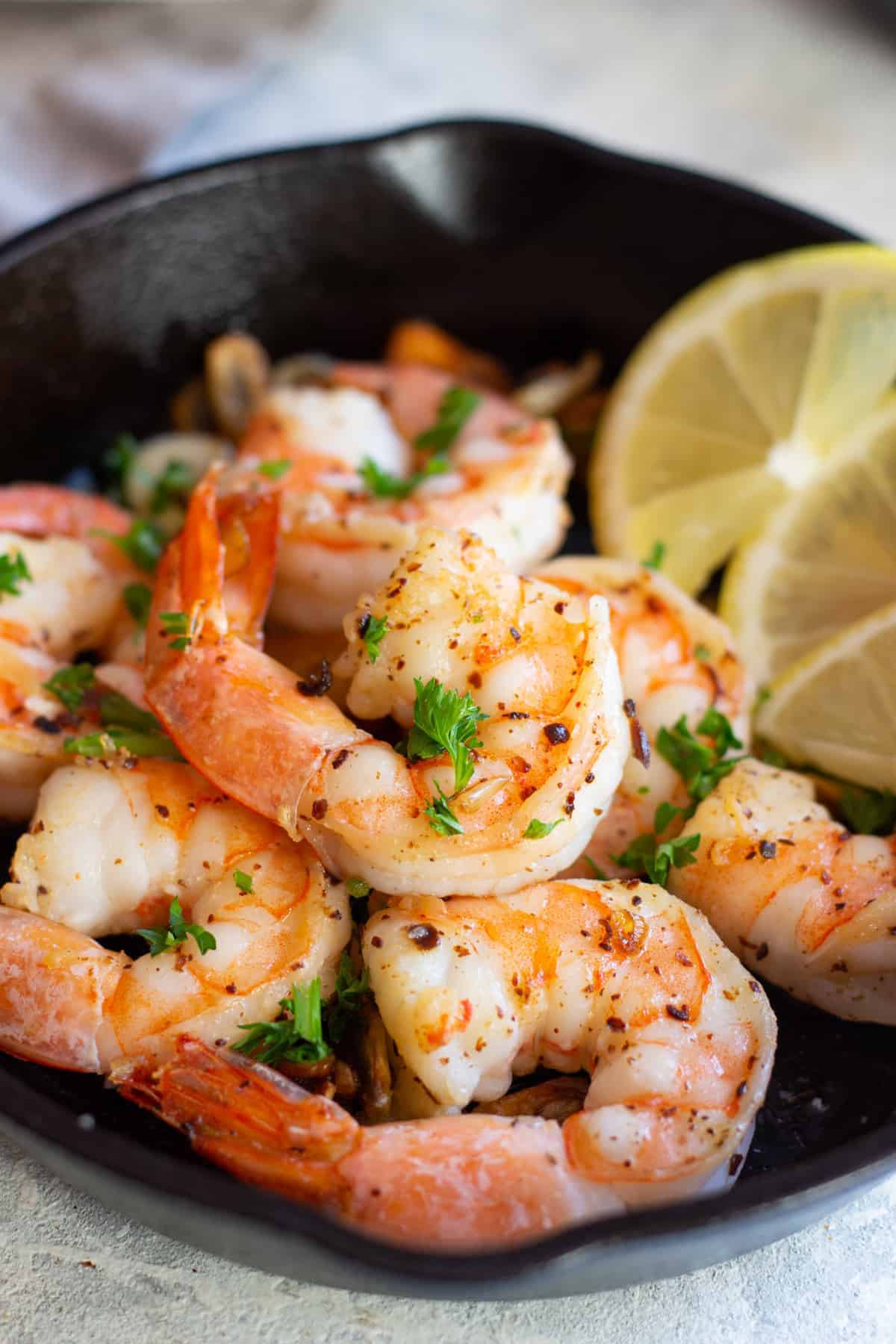 Gambas al ajillo, also known as garlic shrimp, is a classic Spanish tapa that's ready in 10 minutes. Delicious shrimp cooked in olive oil with a lot of garlic, it can’t get any better! 
