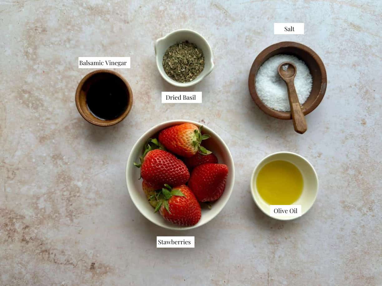 Strawberry Vinaigrette Ingredients strawberry vinaigrette ingredients: strawberries, salt, dried basil, balsamic vinegar, and olive oil