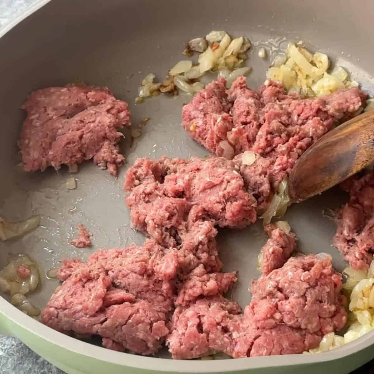 brown the beef in olive oil with onions
