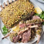 herb crusted rack of lam and sliced lamb.