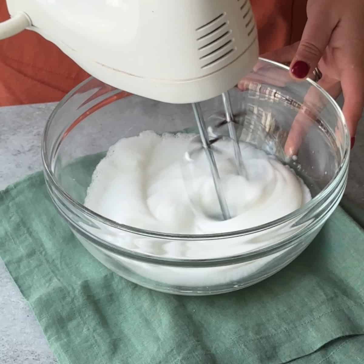 How to Make Amaretti Cookies beat egg whites until peaks form