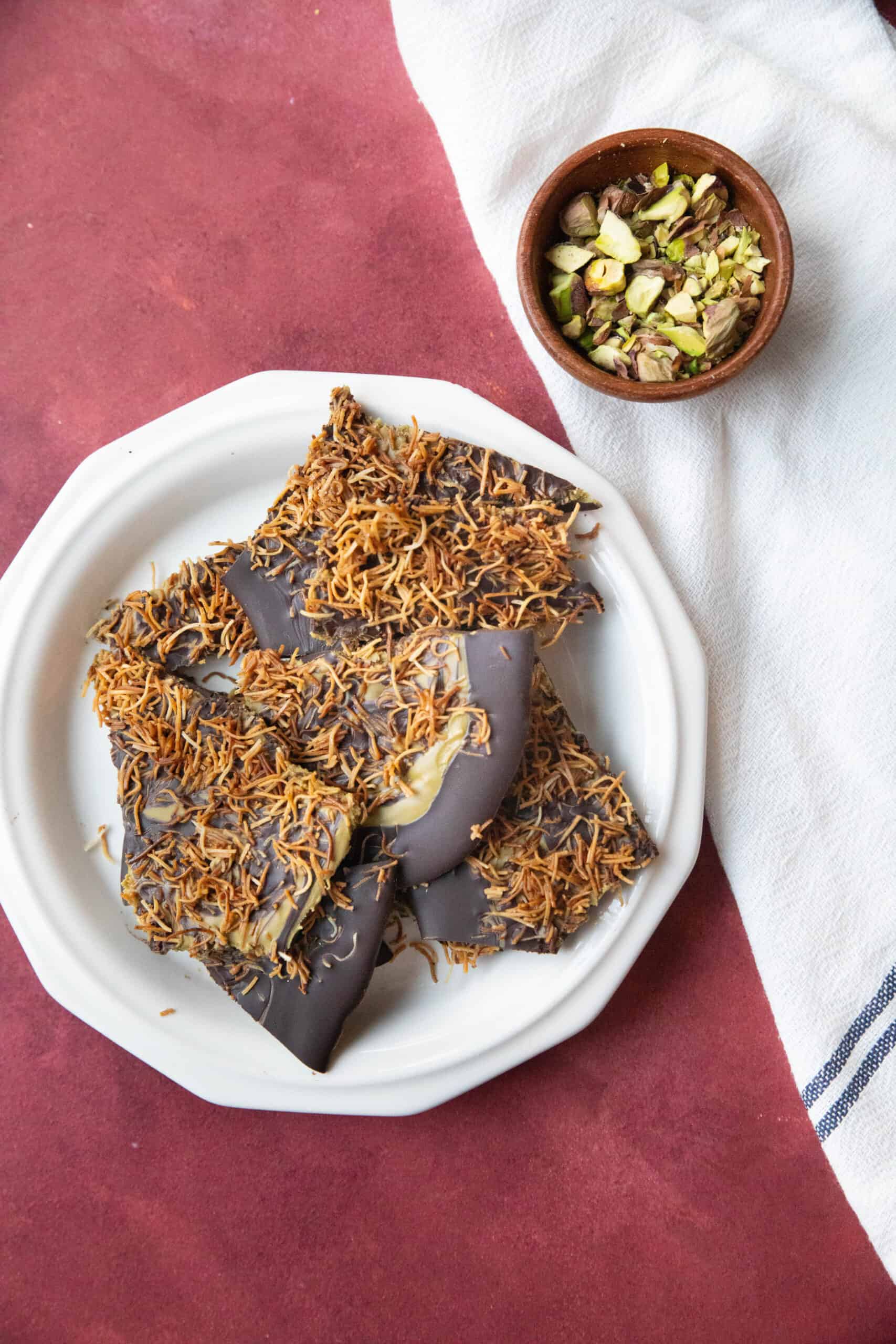 Dubai Chocolate Bark chocolate bark covered with kataifi and pistachio cream.