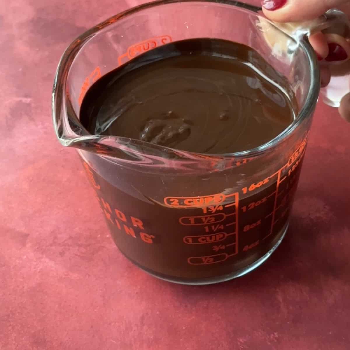 melted chocolate on a measuring cup.