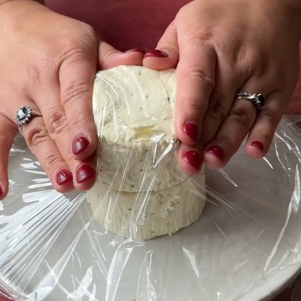 How to Make Christmas Cheese Ball wrap the Boursin cheese well in the plastic wrap