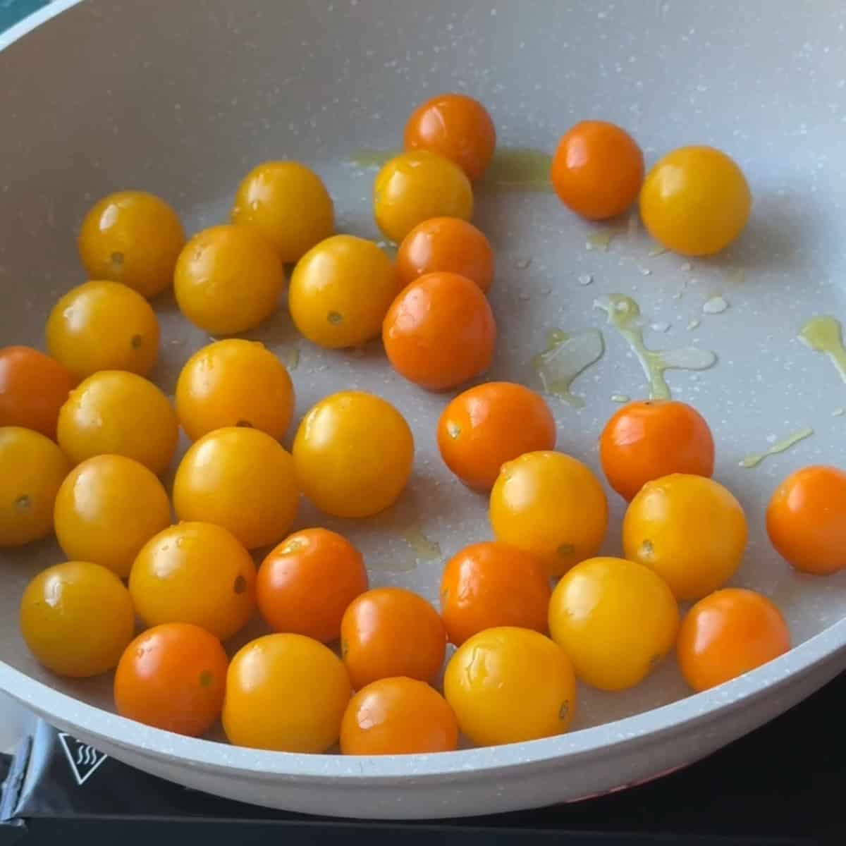 Sear the tomatoes as well.