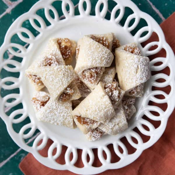 Turkish apple cookies served in white decorative dishes.