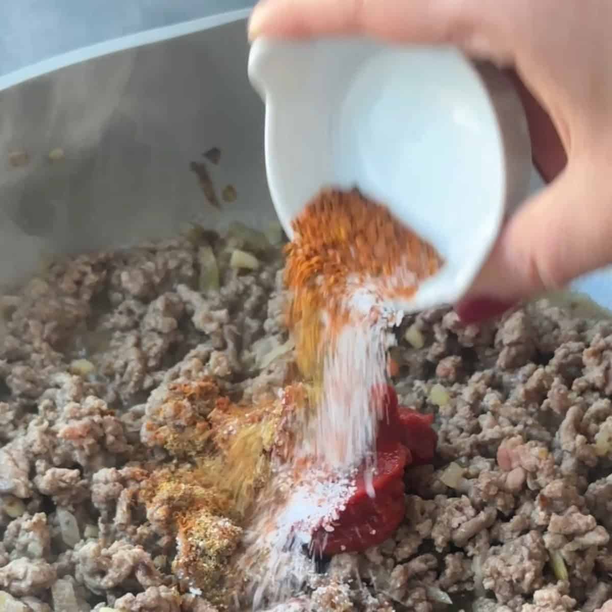 Beef Sauce for Manti Adding the salt and seasoning to the beef mixture