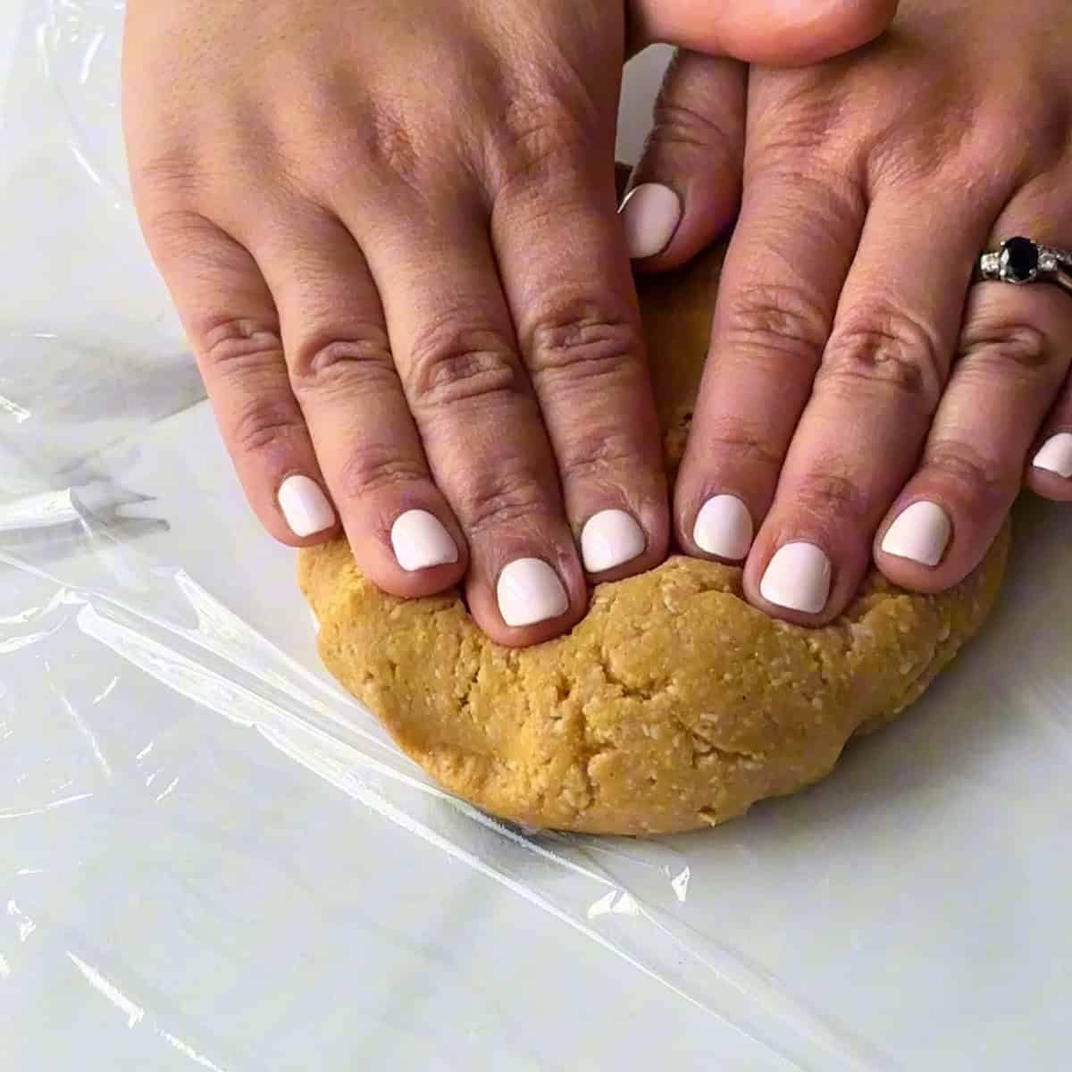 Nan-e-nokhodchi kneading the chickpea flour cookies