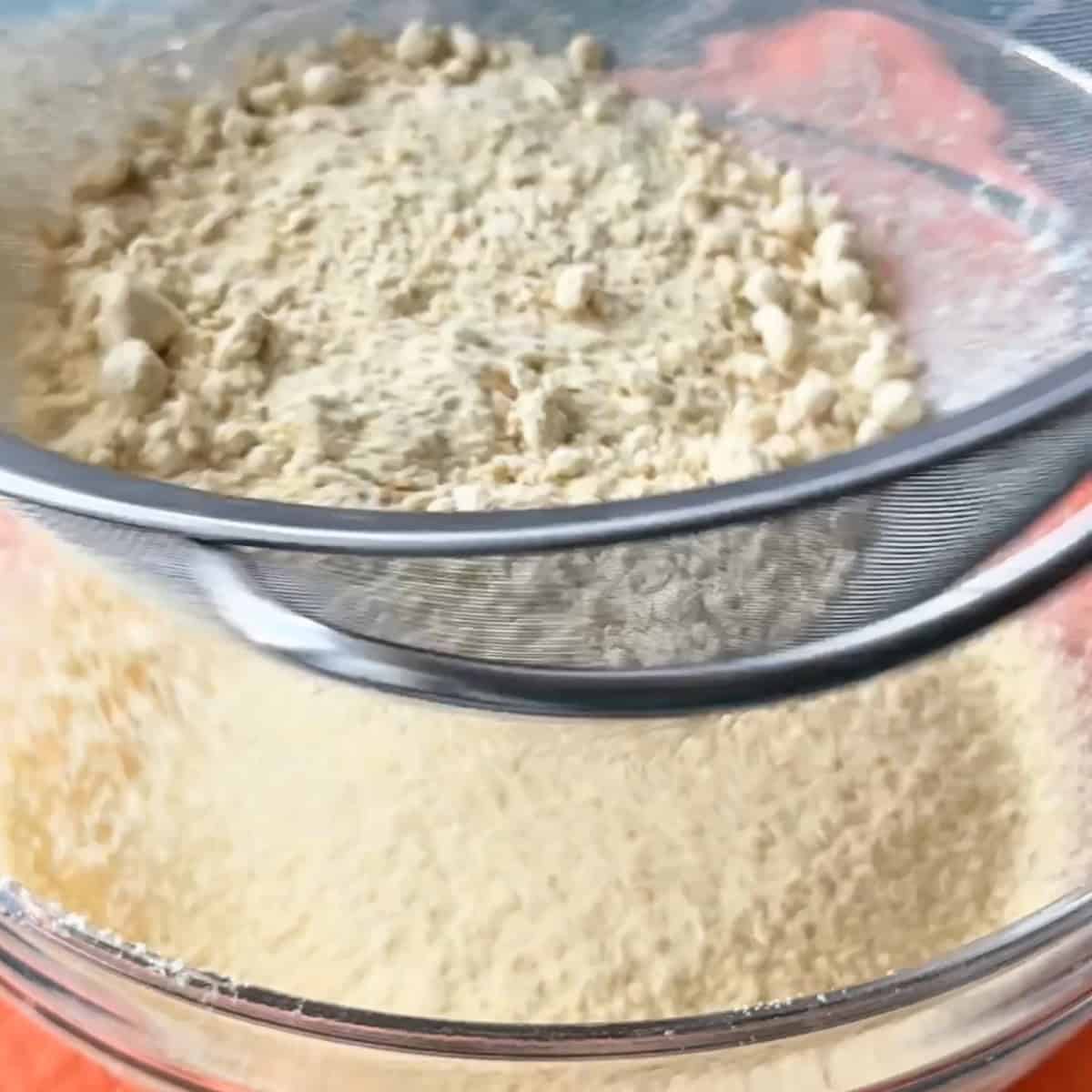 sifting the chickpea flour again over the oil ad sugar mixture