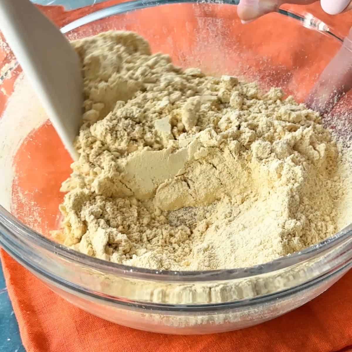 mixing the ingredients using a spatula