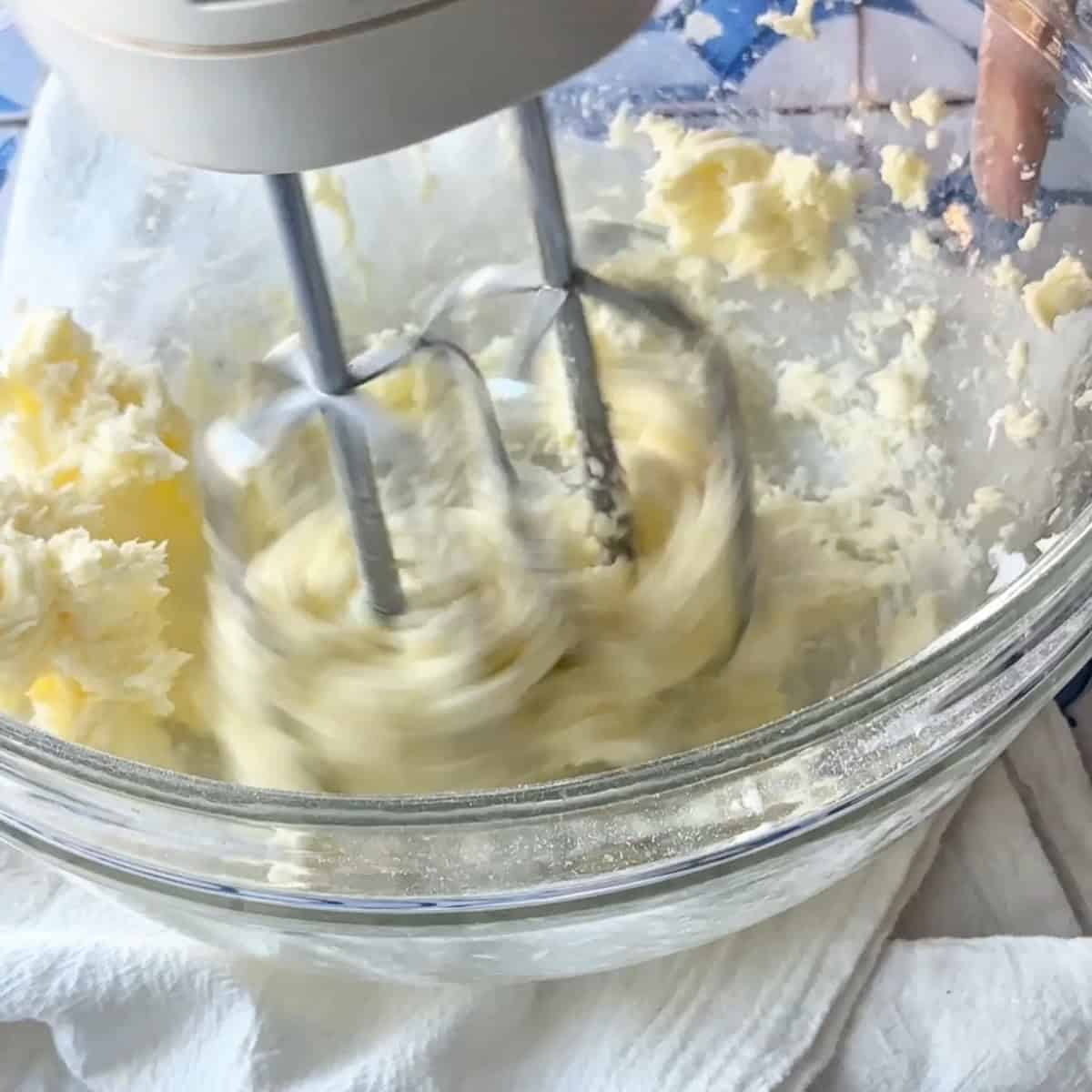 In a large bowl, beat the unsalted butter and powdered sugar using an electric mixer