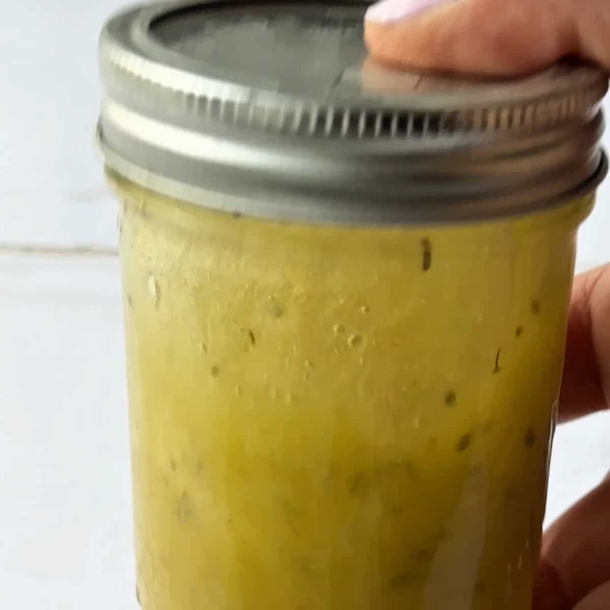 shake vigorously until the dressing is smooth and blended