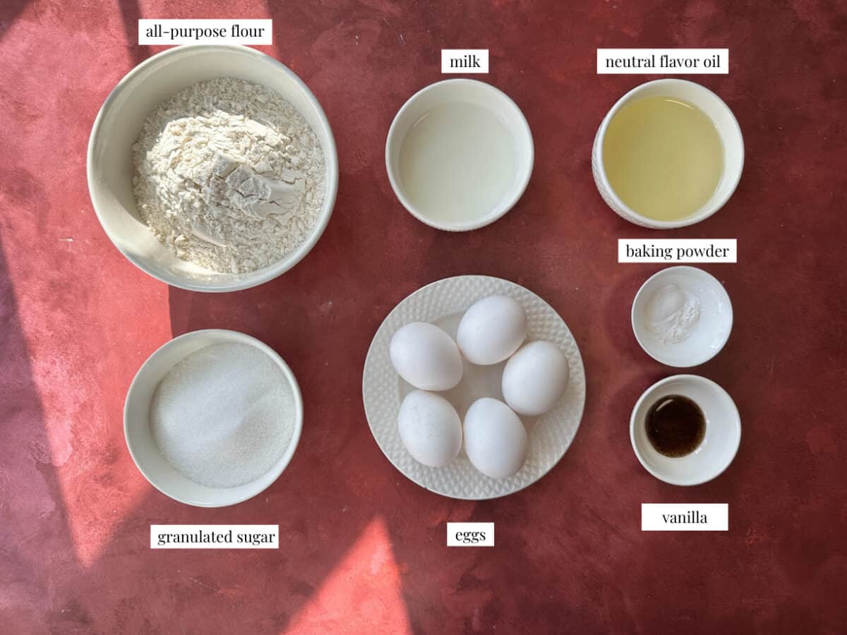 Trilece Sponge Cake Ingredients Labeled ingredients for Trilece: large eggs, sugar, vanilla extract, whole milk, oil, flour, and baking powder