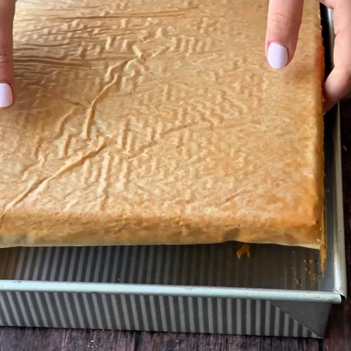 removing the cake from the baking tray