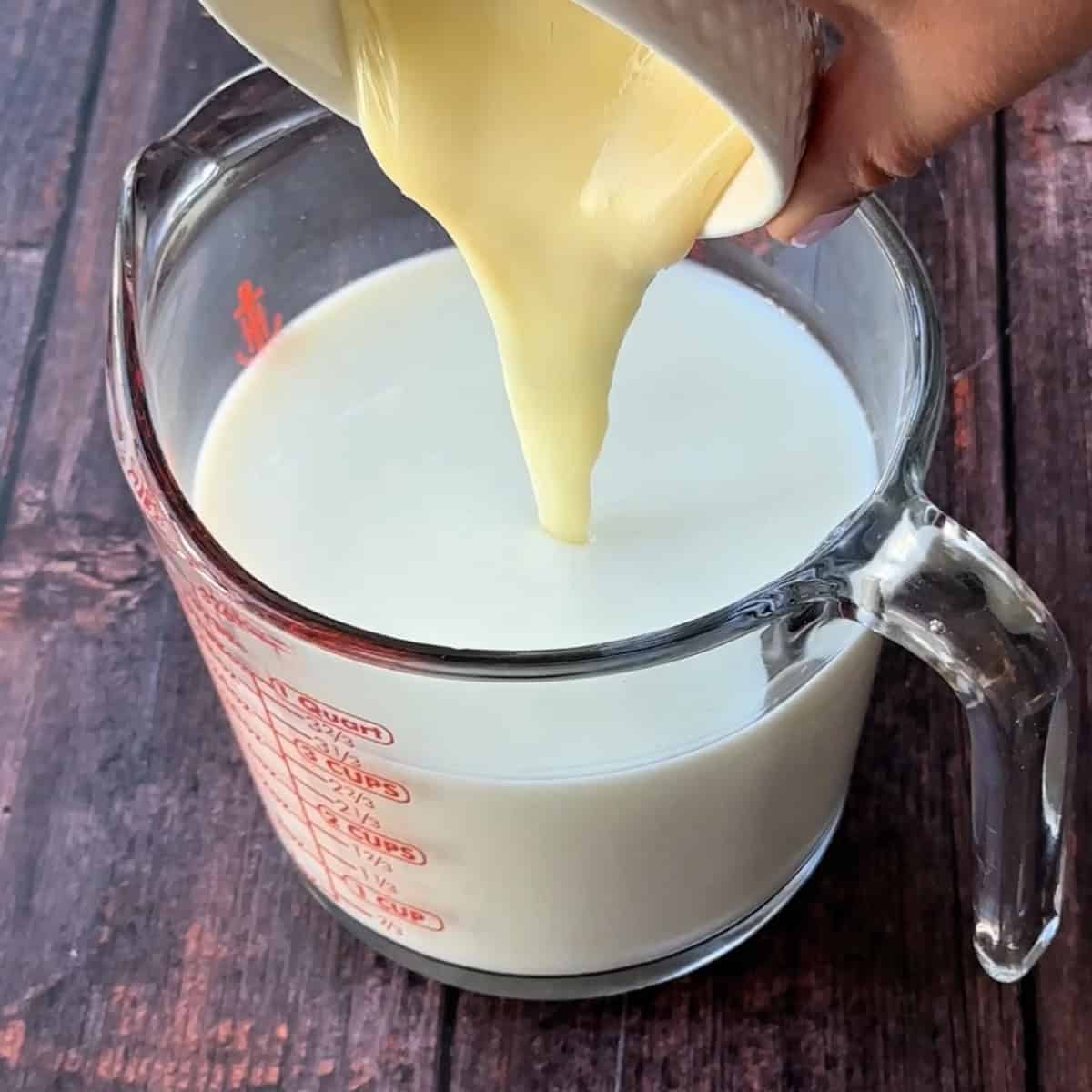 adding sweetened condensed milk to the milk mixture