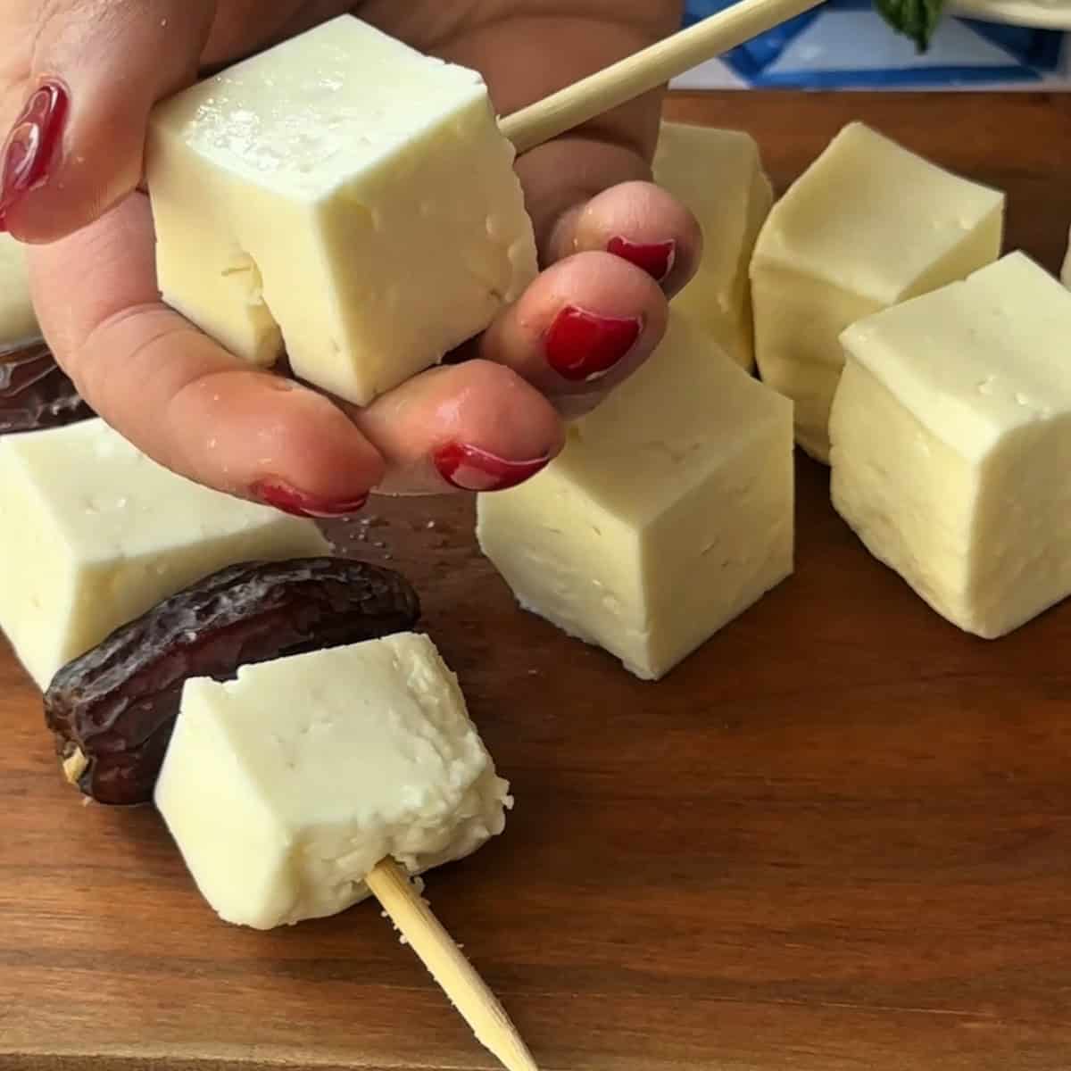 thread the cheese on the skewer