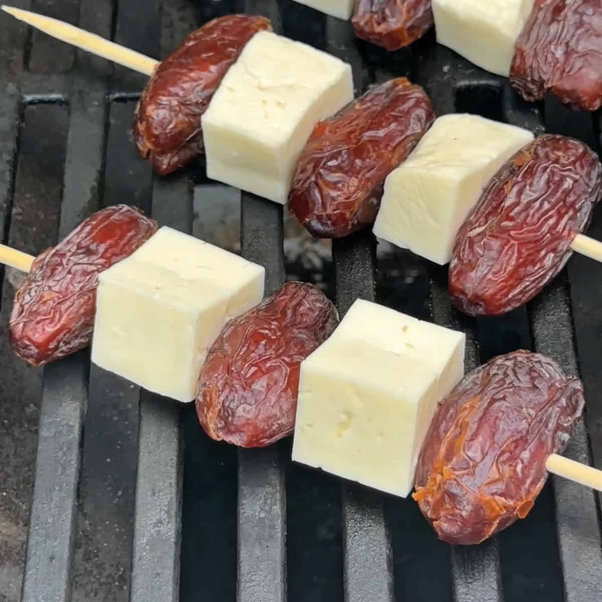 place the skewers on the grill grates and grill for 5 minutes on each side.