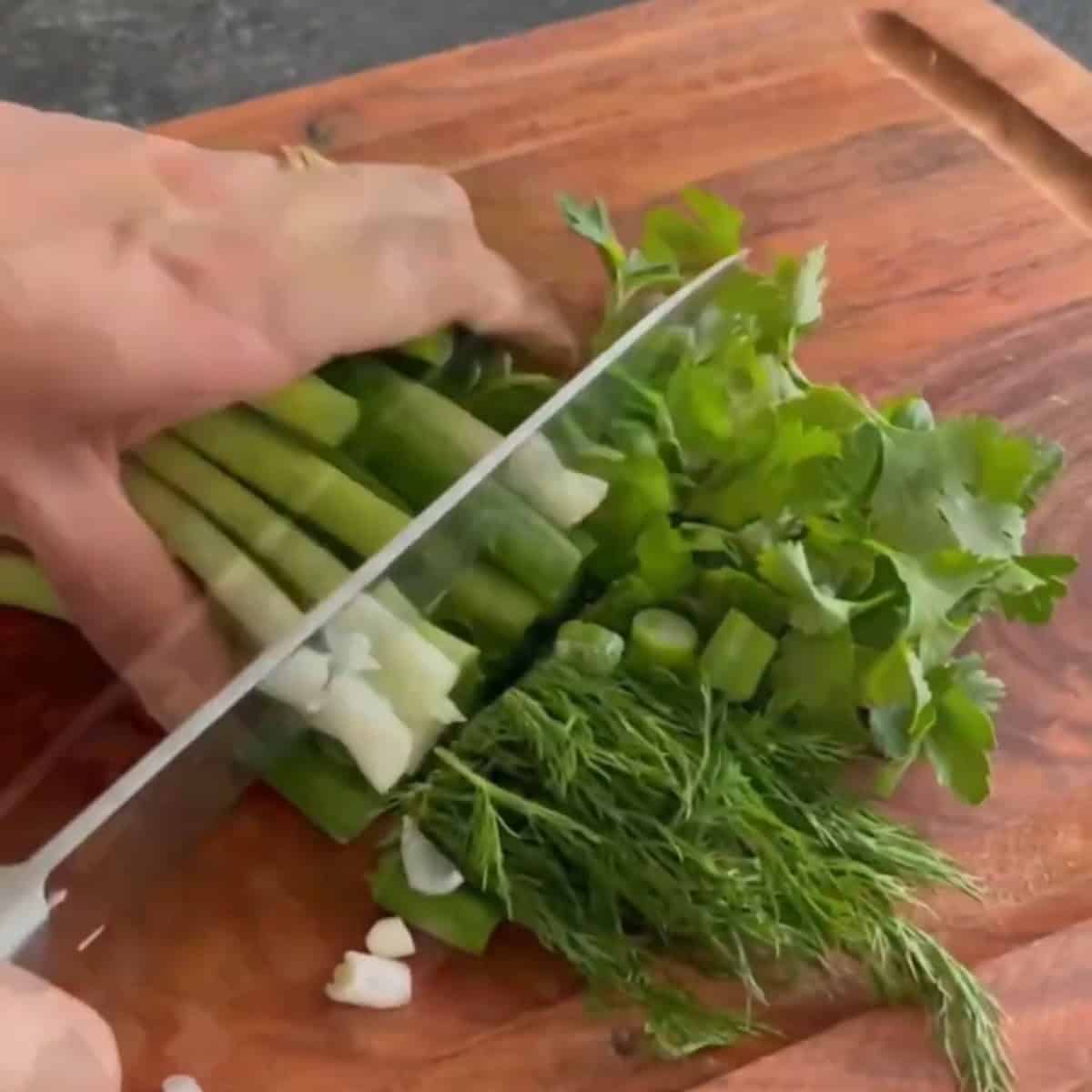 Chop the herbs.