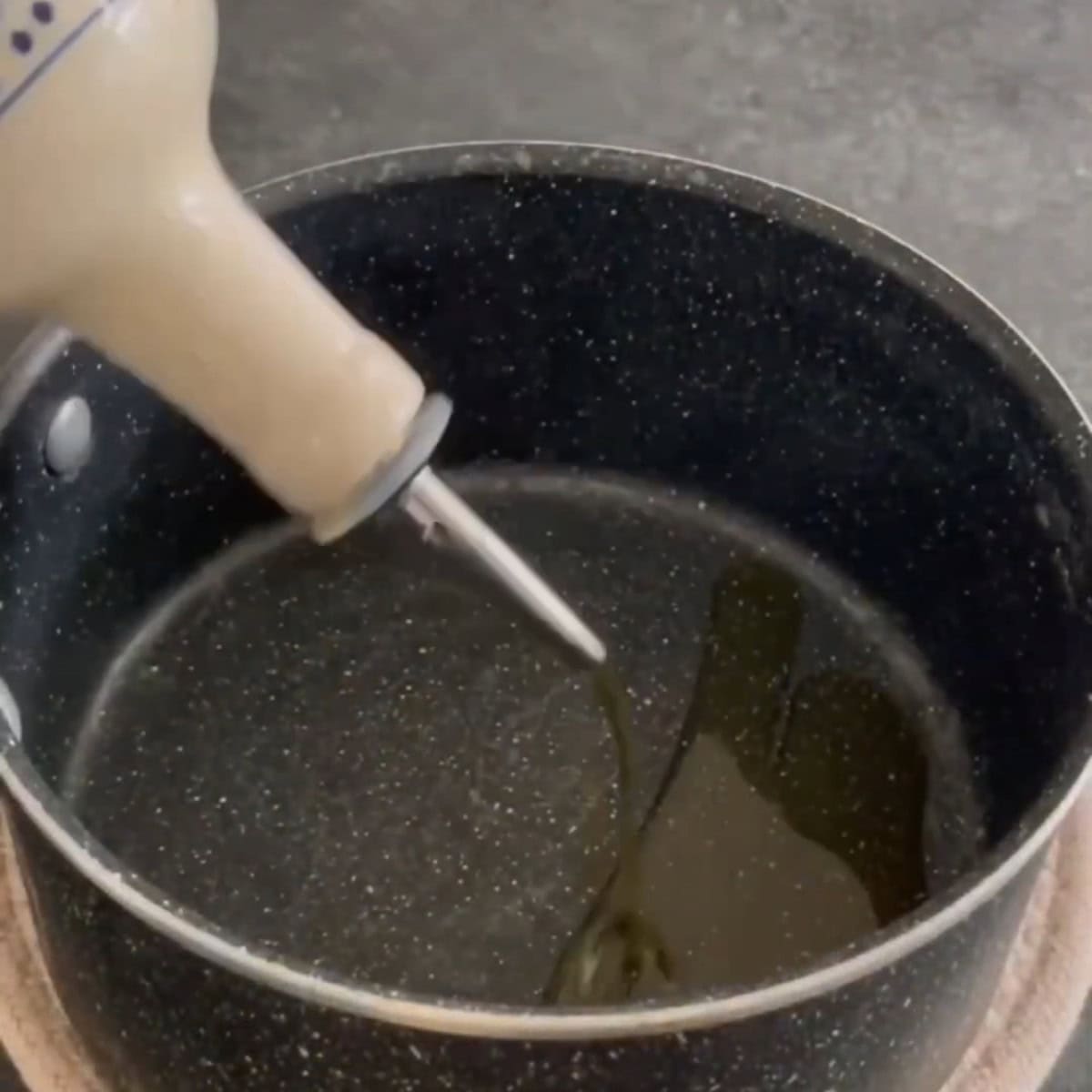 Add oil to the pot.