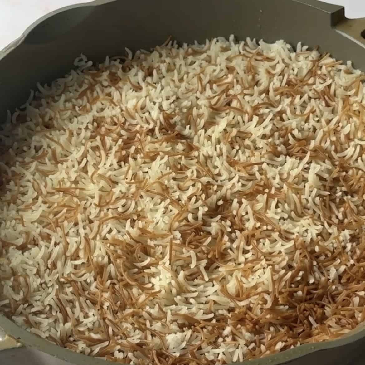 The rice is cooked with the vermicelli. 