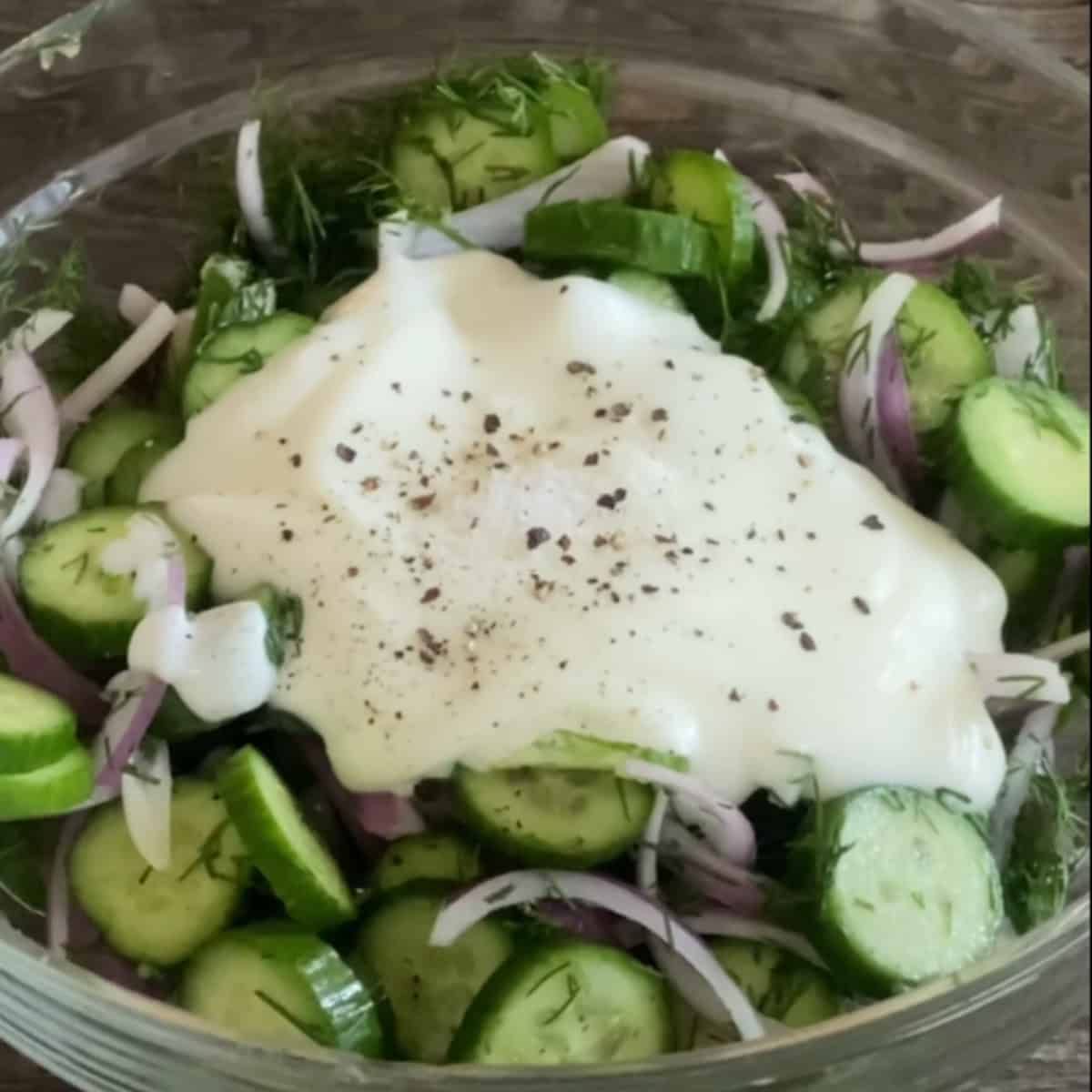 Add the yogurt and pepper and salt to the vegetables.