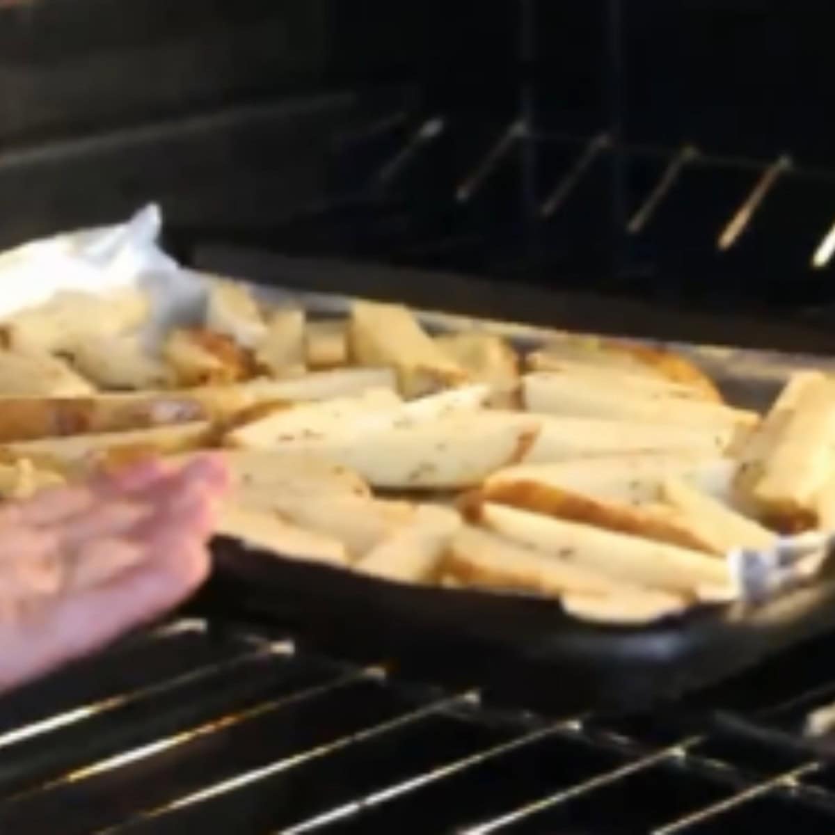 Spread the fries on a baking sheet and bake in the oven. 